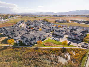 Birds eye view of property with a mountain view