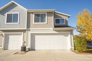 View of front of home featuring a garage