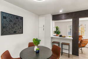 Dining room with light wood-type flooring