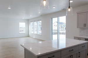 Kitchen with view of living room