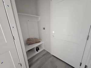 Mudroom with hardwood / wood-style flooring