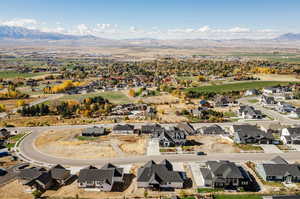 Birds eye view of property with a mountain view