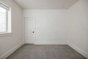 View of carpeted spare room