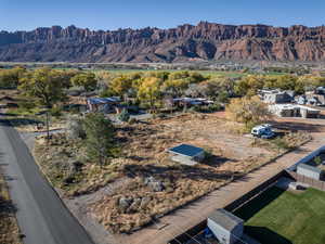 Birds eye view of property with a mountain view