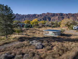 Property view of mountains with a rural view