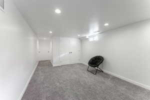 Unfurnished room featuring carpet