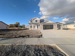 View of front of home with a carport