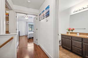 Corridor with light hardwood / wood-style floors