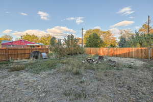 Separated fully fenced area in the backyard to use for all of your yard wish list!