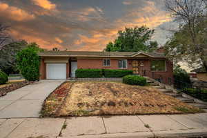 View of front of home with a garage