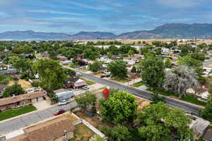 Birds eye view of property with a mountain view