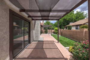 View of back patio / terrace featuring a pergola