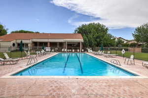 View of swimming pool featuring a patio