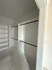 Spacious closet with a barn door