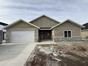 View of front of home featuring a garage