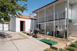 Back of property featuring a patio area