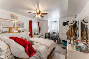 Bedroom featuring carpet flooring and ceiling fan