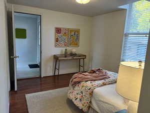 Bedroom featuring dark hardwood / wood-style flooring