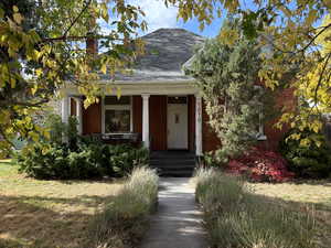 View of front of house featuring covered porch