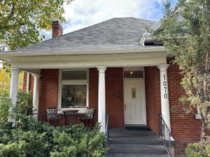 Doorway to property with a porch