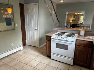 Kitchen with door to basement