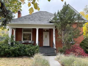 View of front of property featuring covered porch