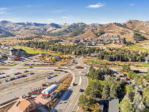 Birds eye view of property with a mountain view