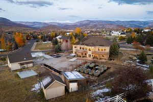 Drone / aerial view featuring a mountain view