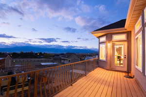 View of deck at dusk