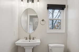 Bathroom with sink and toilet