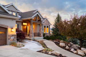 View of front of property with a garage