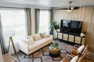 Living room with hardwood / wood-style floors