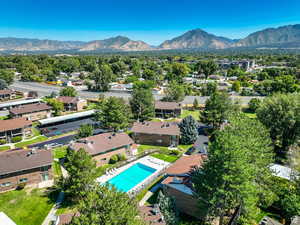 Birds eye view of property with a mountain view