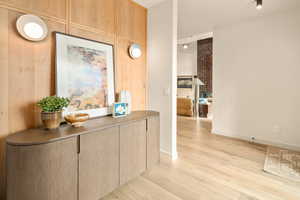 Corridor featuring light hardwood / wood-style floors