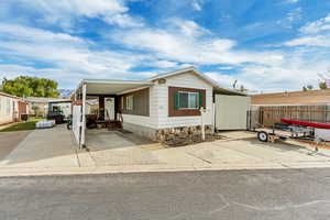 Carport and large RV-covered parking