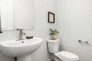 Bathroom featuring toilet and sink