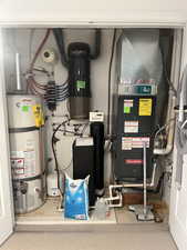 Utility room with secured water heater