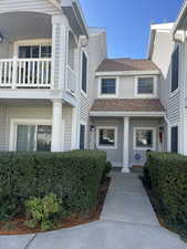 View of front of home with a balcony