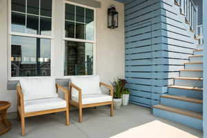 View of covered patio / terrace and a built in storage shed