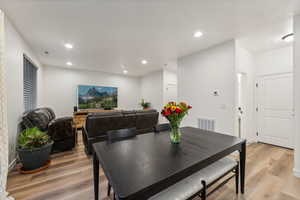 Dining space featuring light hardwood / wood-style floors