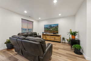 Living room featuring light hardwood / wood-style flooring