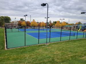 View of tennis court featuring about 8 minutes away per google maps (if you walk)  (Or two minutes away if you drive)