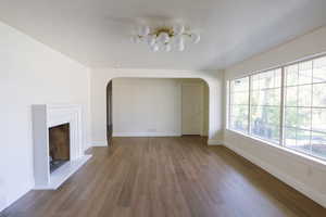 Unfurnished living room with light wood-type flooring