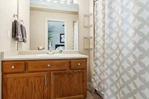 Bathroom featuring vanity and tile patterned floors