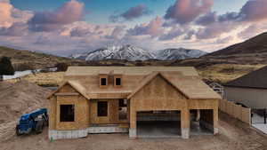 Property under construction featuring a mountain view