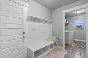 Mudroom off the garage and adjacent laundry room