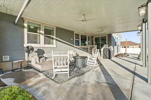 Large patio area with ceiling fans