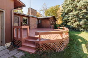 Wooden deck with a lawn