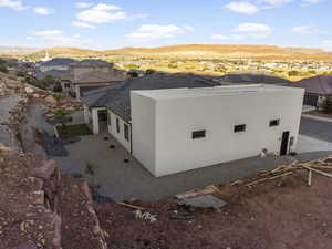 View of side of property with a mountain view