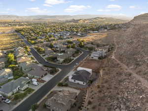 Birds eye view of property with a mountain view